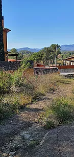 TERRENO EDIFICABLE EN ZONA RESIDENCIAL GOLF DE SANT JULIA DE RAMIS